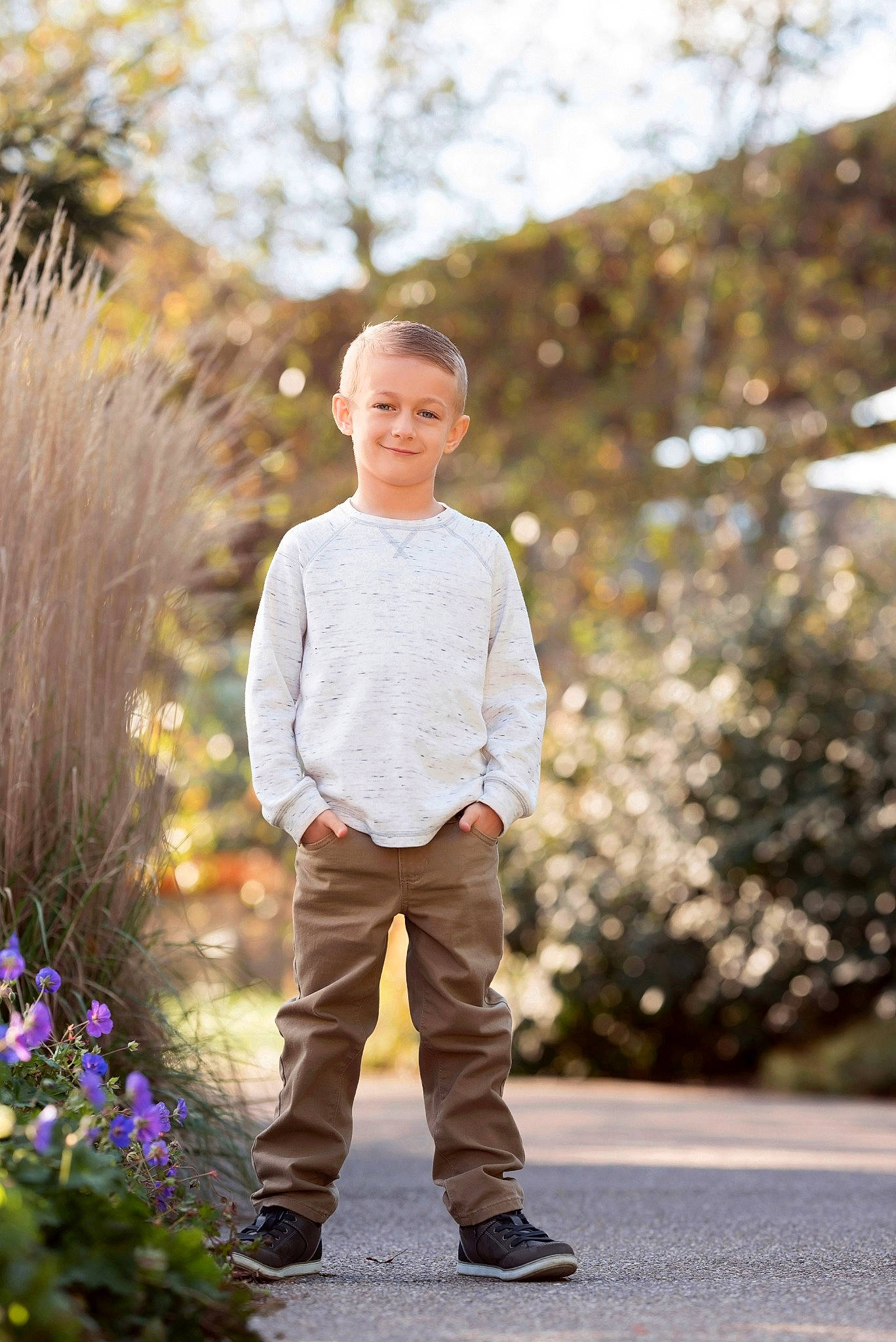Dawson Cole is registered to the contest to win money with this photo: child, child_model, denim, flower, joy, male, people_in_nature, person, photograph, photography, plant, portrait, portrait_photography, spring, standing, t_shirt, toddler, vacation, wildflower