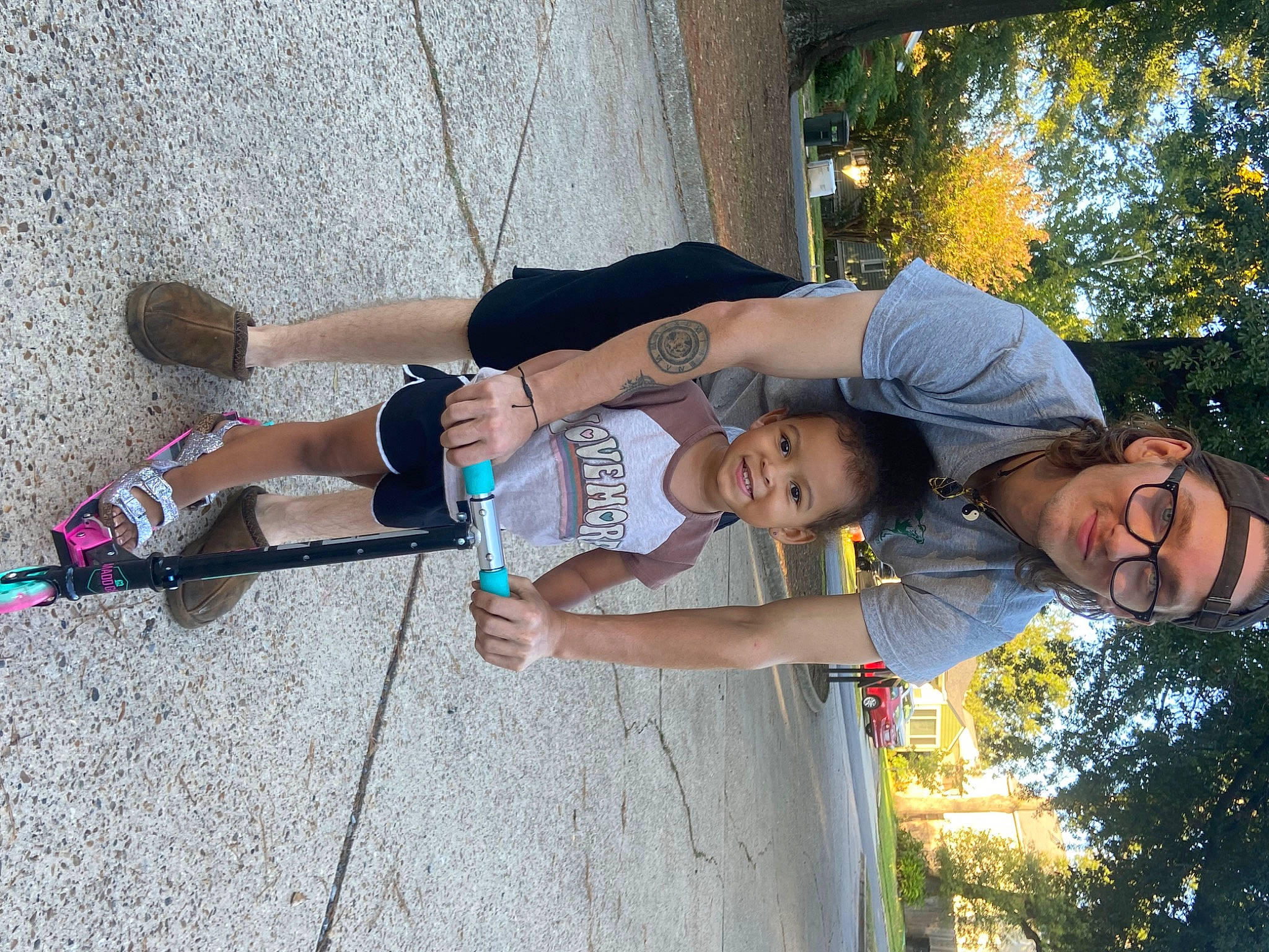 Milani is registered to the contest to win money with this photo: arm, child, elbow, fun, gesture, happy, headwear, human_leg, joy, knee, leg, leisure, outdoor_shoe, person, recreation, shorts, smile, sneakers, sports, t_shirt