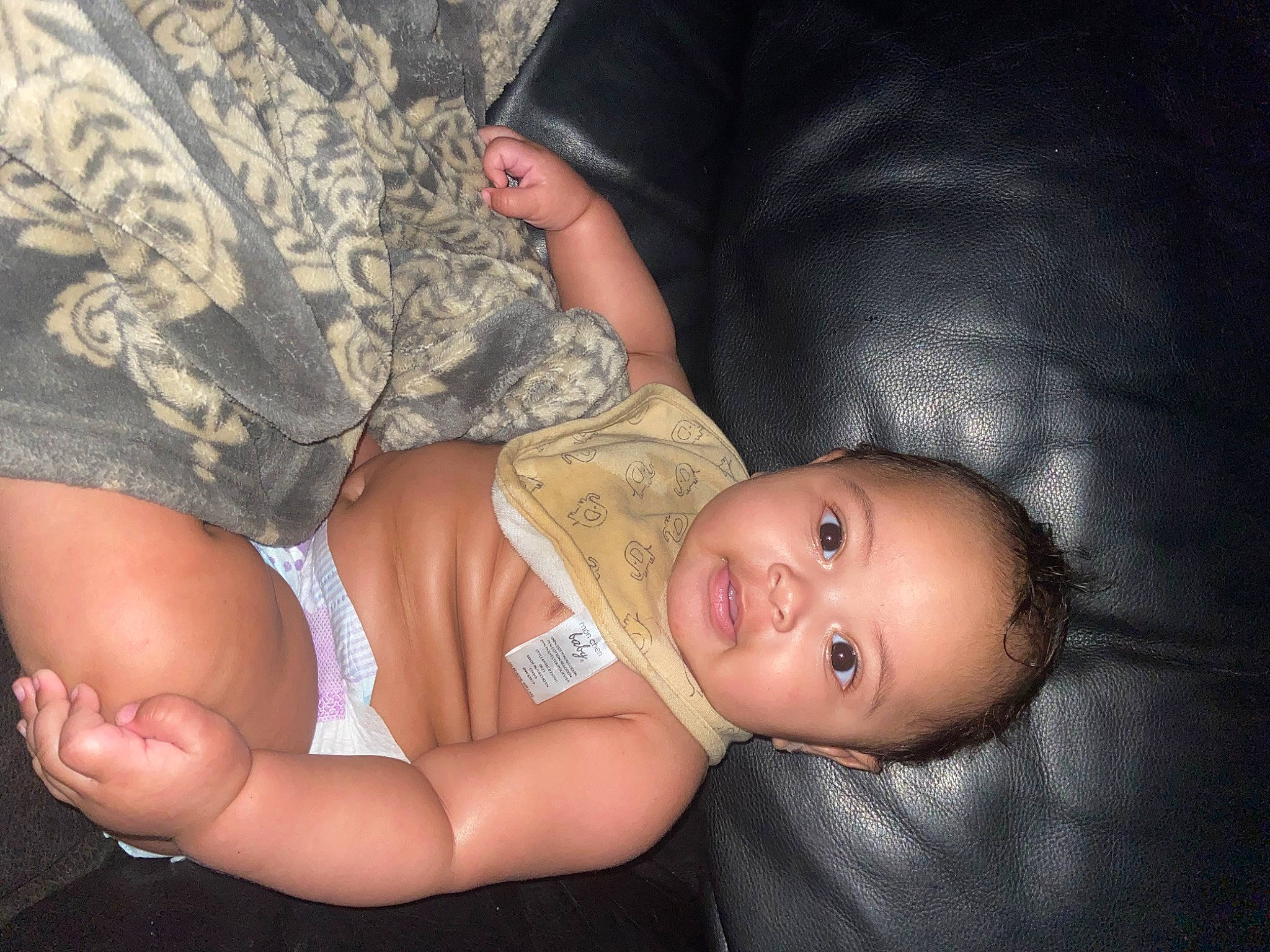 Gavin is registered to the contest to win money with this photo: abdomen, baby, baby_toddler_clothing, chest, comfort, elbow, eye, finger, flash_photography, gesture, human_body, human_leg, joint, knee, leg, person, skin, stomach, thigh, toddler