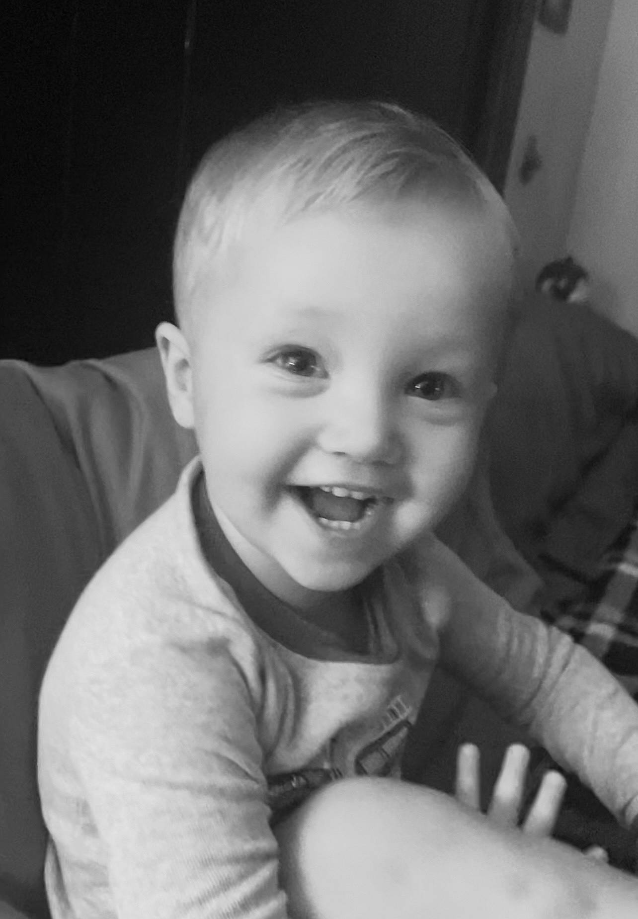 Lane is registered to the contest to win money with this photo: arm, black_and_white, cheek, eyebrow, facial_expression, finger, flash_photography, gesture, hairstyle, iris, joy, lip, mouth, muscle, nose, organ, person, skin, sleeve, smile