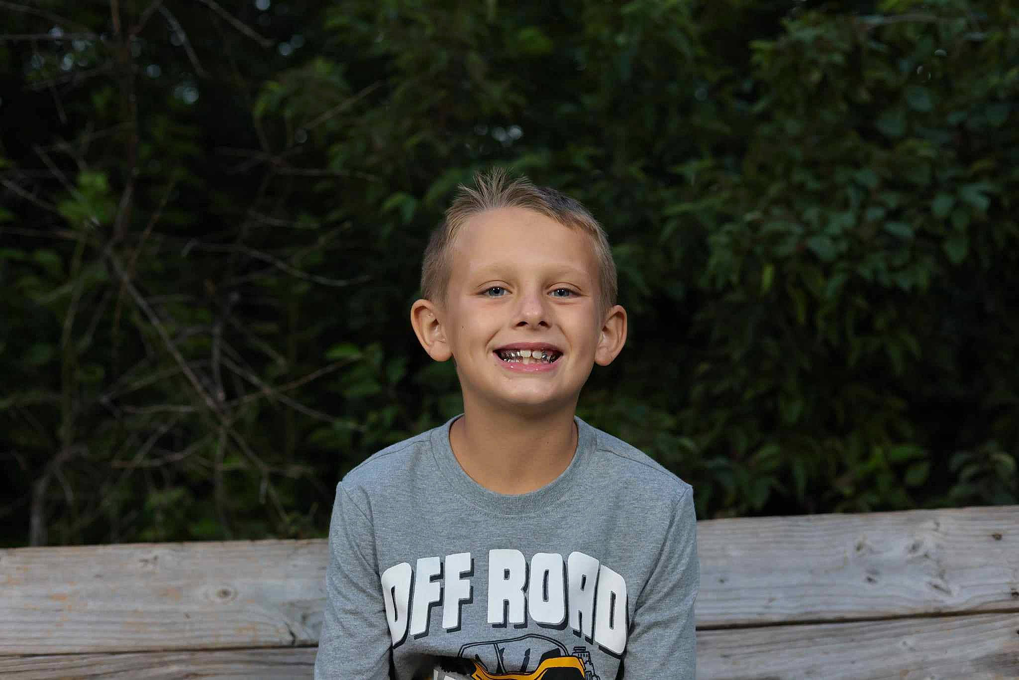 Chevy joined the competition — help win amazing prizes! child, event, flash_photography, forest, fun, grass, happy, joy, laugh, leisure, person, plant, portrait, portrait_photography, recreation, sitting, smile, t_shirt, toddler, tree