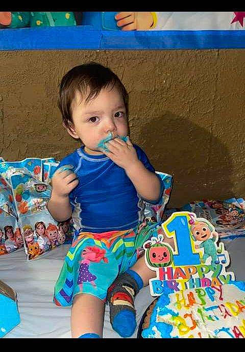 Alejandro joined the competition — help win amazing prizes! baby, baby_products, baby_toddler_clothing, cheek, child, electric_blue, flooring, fun, hairstyle, happy, leisure, pattern, person, play, room, sitting, sleeve, t_shirt, toddler, visual_arts