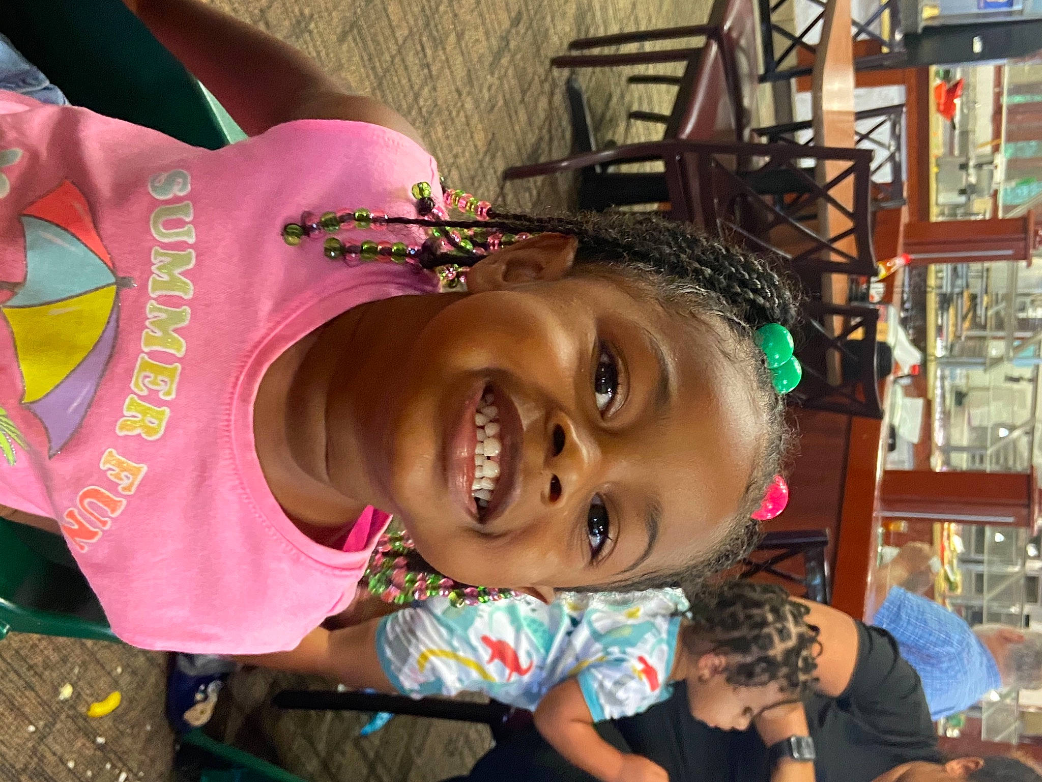 Taeya is registered to the contest to win money with this photo: bicycle_wheel, chest, child, event, facial_expression, fun, happy, human, joy, laugh, leisure, magenta, mammal, people, person, public_space, skin, smile, snapshot, t_shirt