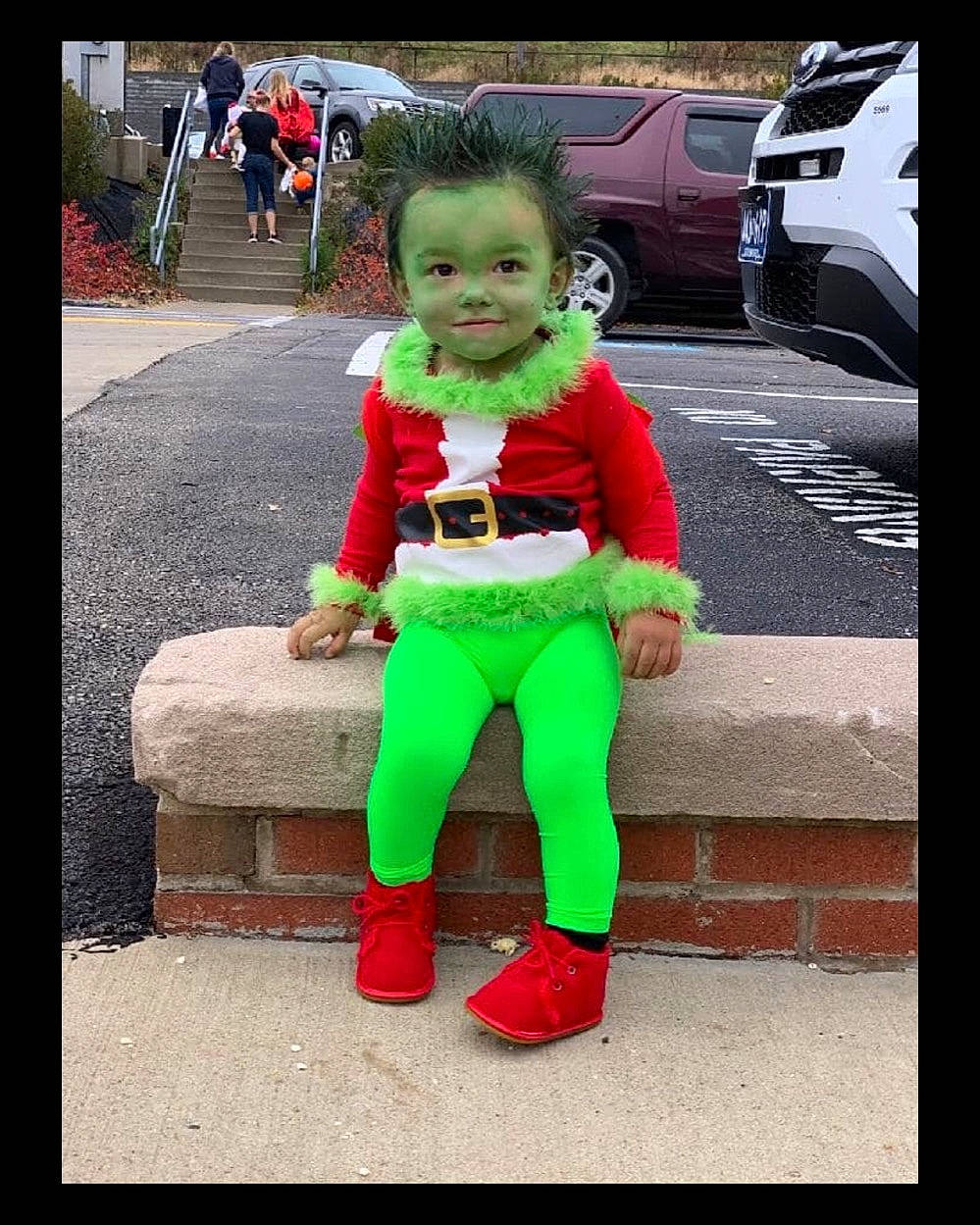 Easton is registered to the contest to win money with this photo: car, child, costume, fictional_character, joy, person, smile, toddler