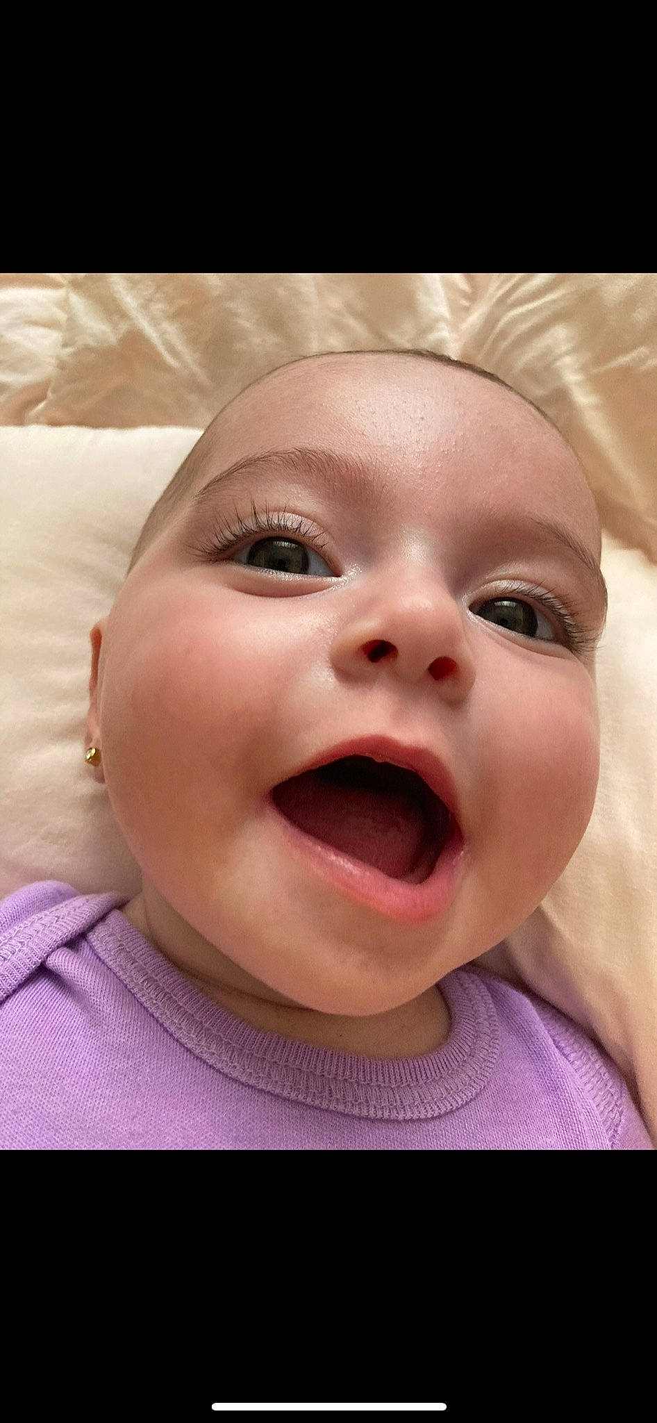 Alessandra is registered to the contest to win money with this photo: baby, baby_laughing, cheek, eye, eyebrow, eyelash, gesture, happy, human_body, iris, jaw, lip, mouth, neck, nose, person, pink, skin, smile, tongue