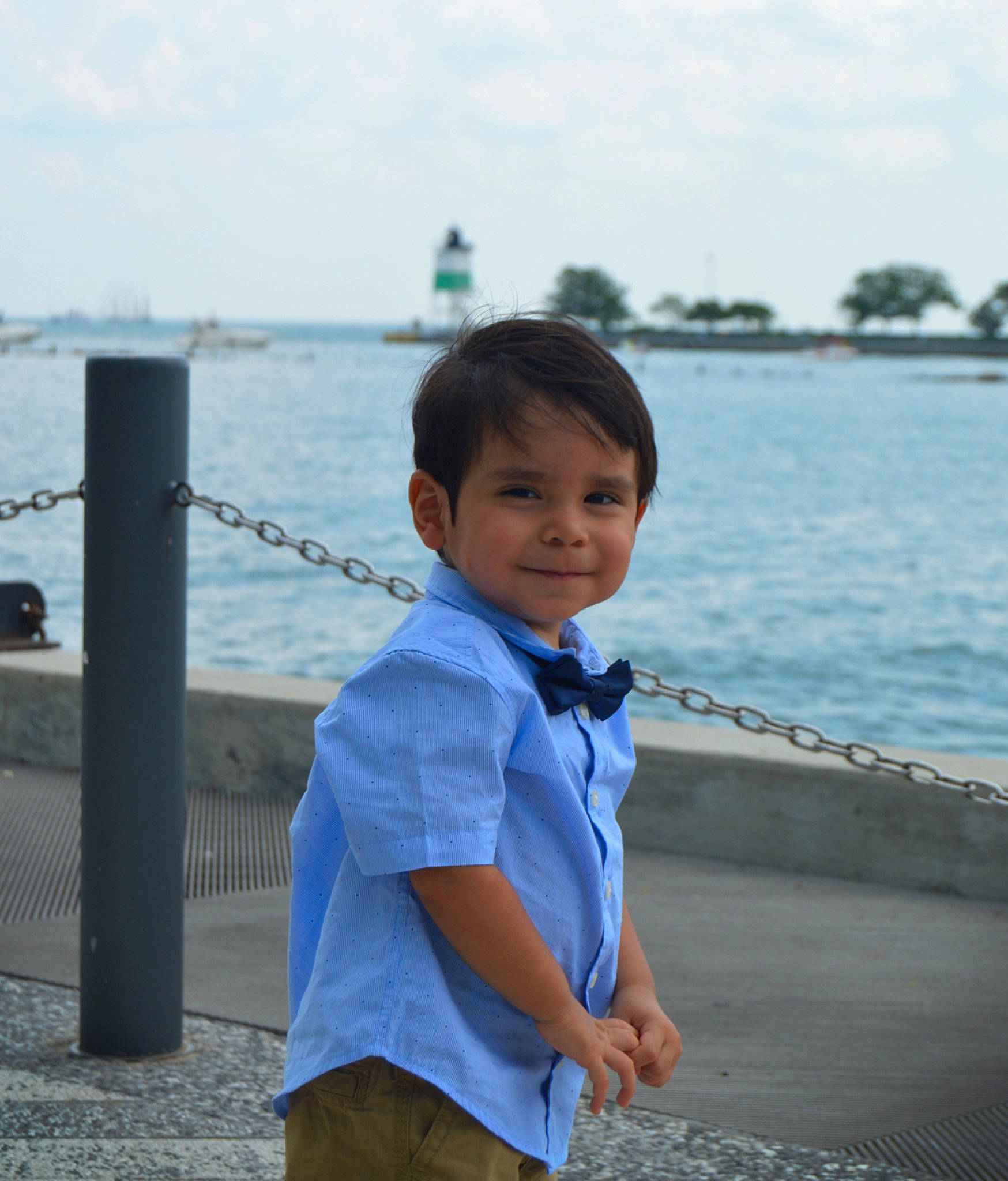 Jose is registered to the contest to win money with this photo: beach, child, joy, ocean, person, sea, smile, snapshot, summer, toddler, tourism, vacation