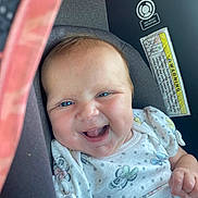 Scarlett joined the competition — help win amazing prizes! accessories, baby, babylaughing, bodypart, clothing, cushion, face, happy, head, homedecor, laughing, mouth, newborn, person, photography, portrait, selfie, smile, t_shirt, teeth