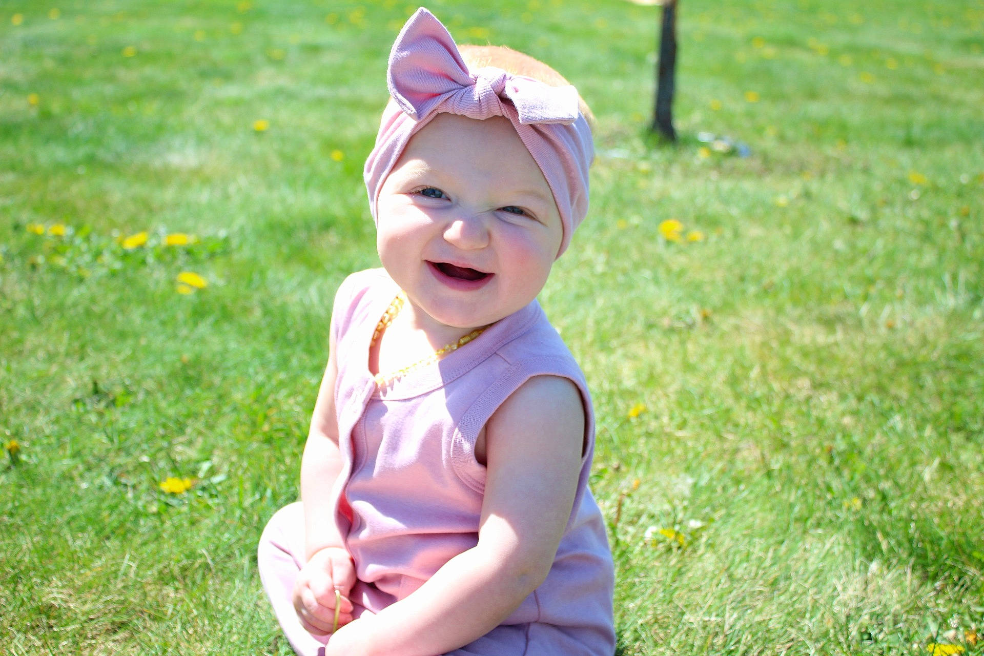 Elodie is registered to the contest to win money with this photo: baby, child, ear, fun, grass, happy, headwear, joy, meadow, people_in_nature, person, photography, plant, play, smile, summer, toddler