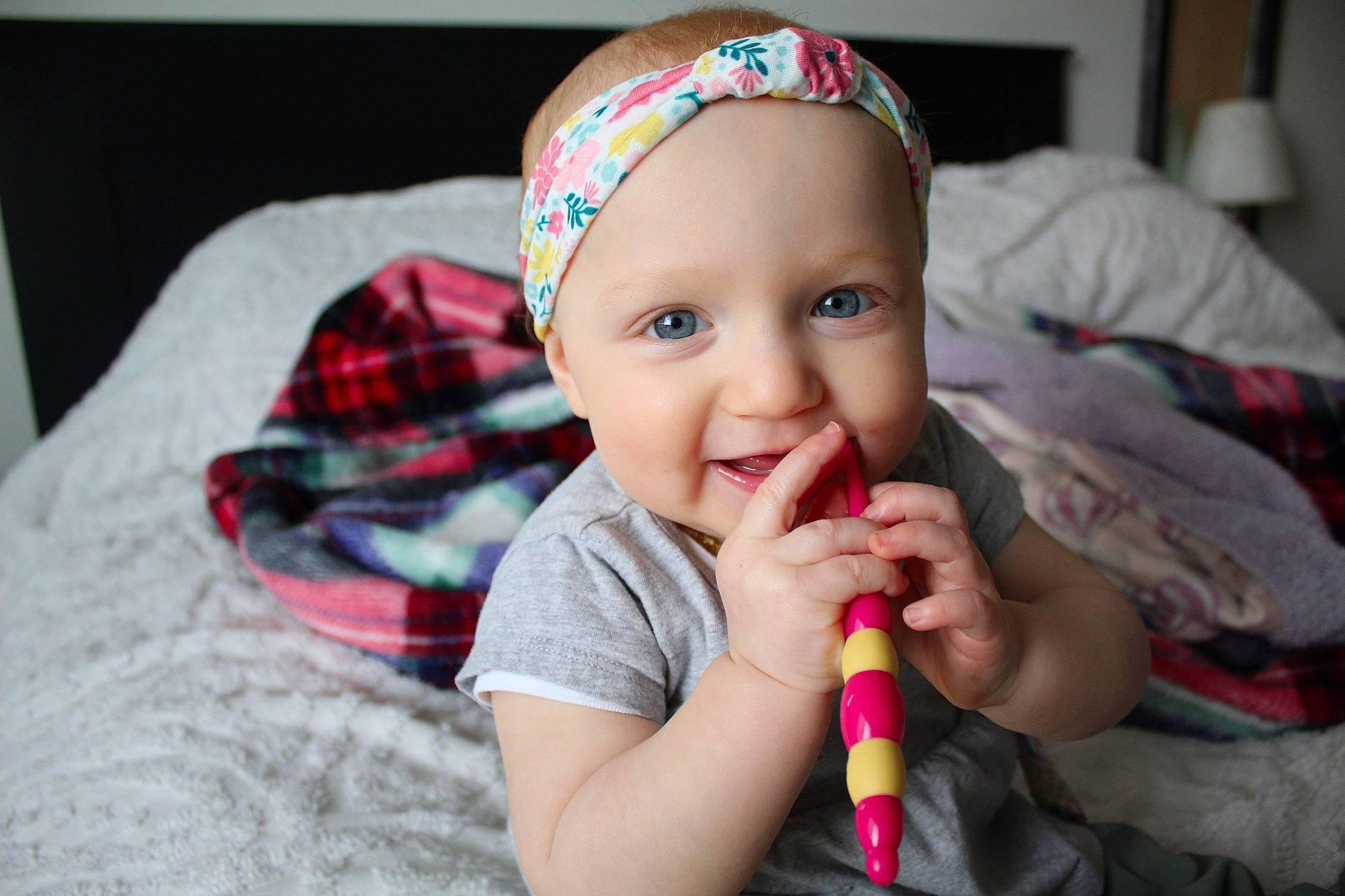 Elodie joined the competition — help win amazing prizes! baby, cheek, child, face, fashion_accessory, finger, hair_accessory, head, headband, headgear, headwear, lip, mouth, nose, person, pink, play, skin, smile, toddler