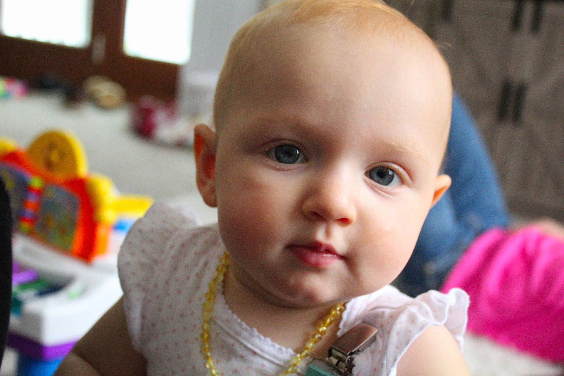 Elodie is registered to the contest to win money with this photo: baby, cheek, child, close_up, ear, eye, face, fun, head, iris, lip, mouth, nose, person, play, skin, smile, toddler, vacation