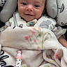 Blakely joined the competition — help win amazing prizes! baby, infant, smiling, blanket, pacifier, cute, child, face, cozy, comfort, soft, pattern, seat, toy, warm, clothing, headrest, expression, portrait, indoor