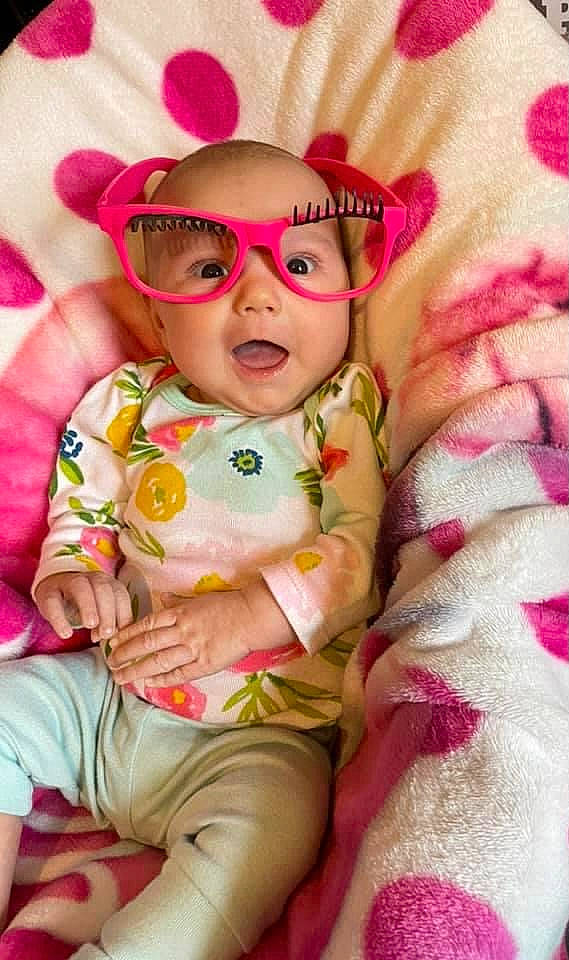 Allyson joined the competition — help win amazing prizes! arm, baby_toddler_clothing, cheek, comfort, dress, eye, face, finger, glasses, goggles, hand, happy, head, lip, person, pink, skin, sleeve, sunglasses, textile