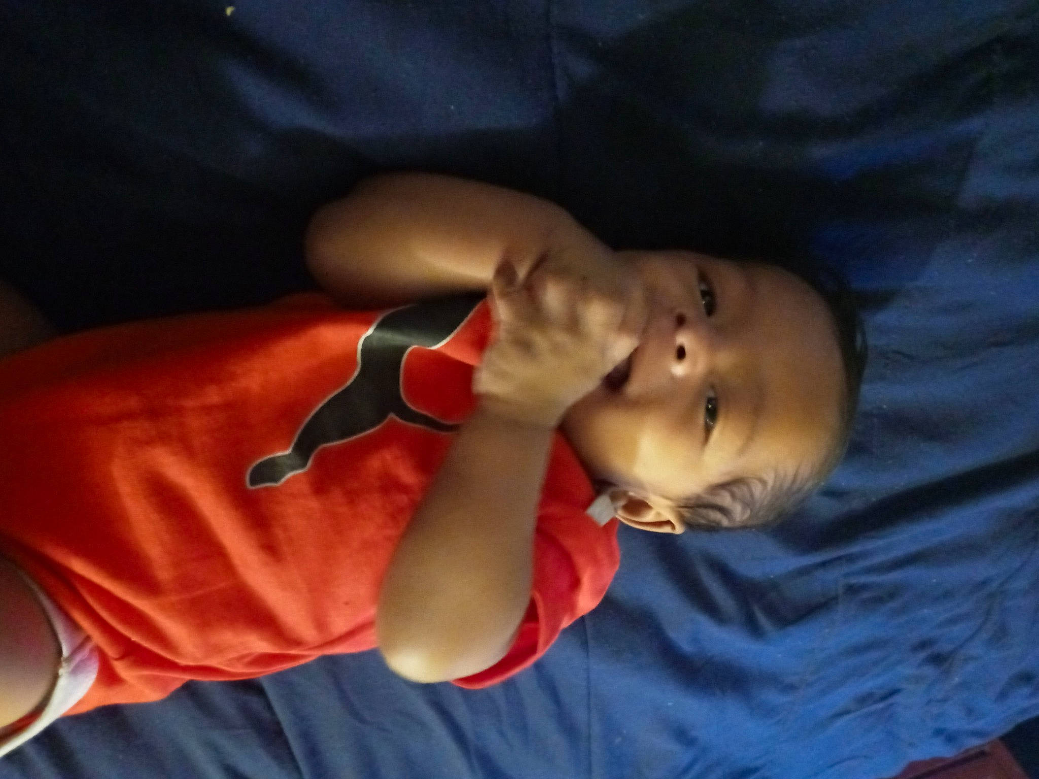 Zai'Dyn is registered to the contest to win money with this photo: arm, baby, child, ear, elbow, hand, muscle, nose, person, toddler