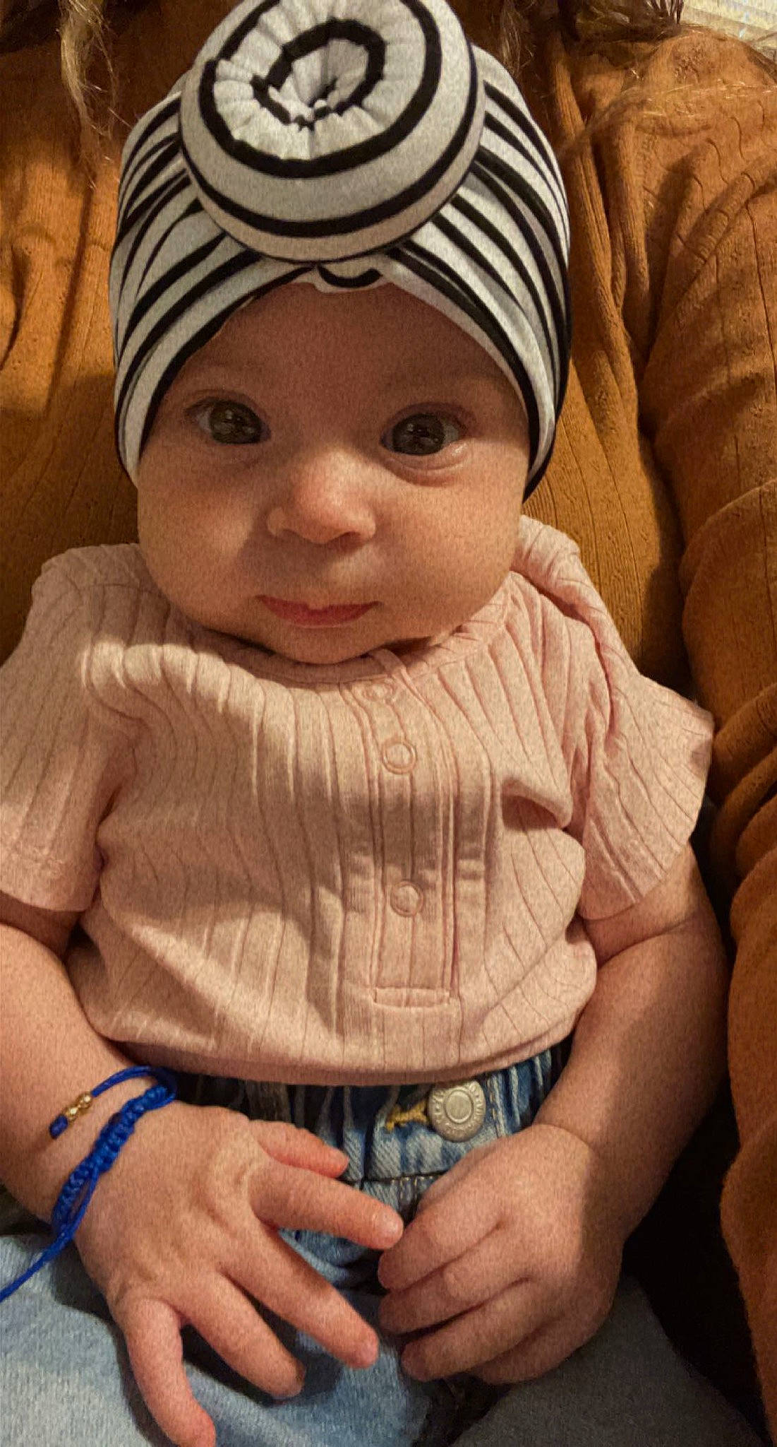 Catalaya is registered to the contest to win money with this photo: baby, baby_toddler_clothing, cap, cheek, cool, eye, finger, forehead, hand, happy, head, headwear, knit_cap, mouth, nose, organ, person, skin, sleeve, thumb