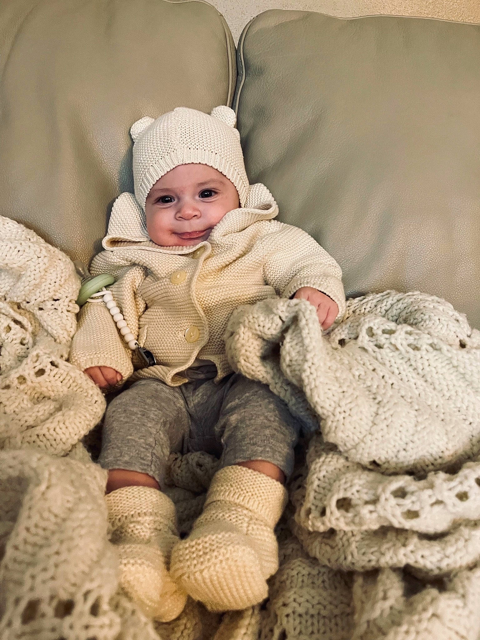 Catalaya is registered to the contest to win money with this photo: baby, baby_sleeping, baby_toddler_clothing, cap, cheek, comfort, eye, head, headgear, headwear, knit_cap, linens, mammal, outerwear, person, skin, sleeve, smile, textile, toddler