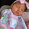 Sutton joined the competition — help win amazing prizes! baby, sleeping, headband, pink_bow, plush_toy, embroidery, clothing, infant, face, closeup, cute, soft, peaceful, child, resting, newborn, textile, pattern, car, toy