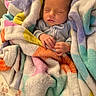 newborn, baby, sleeping, blanket, colorful, soft, pastel, hands, cozy, cute, infant, wrapped, resting, peaceful, portrait, child, fabric, warm, indoor, comfort