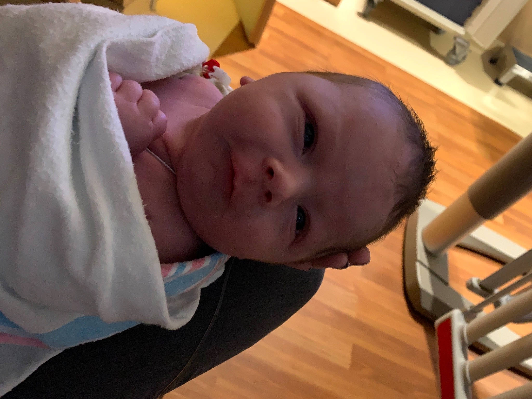 Boyd is registered to the contest to win money with this photo: baby, baby_products, baby_safety, baby_toddler_clothing, cheek, child, comfort, flooring, fun, happy, hardwood, laminate_flooring, nose, person, room, smile, toddler, varnish, wood, wood_flooring