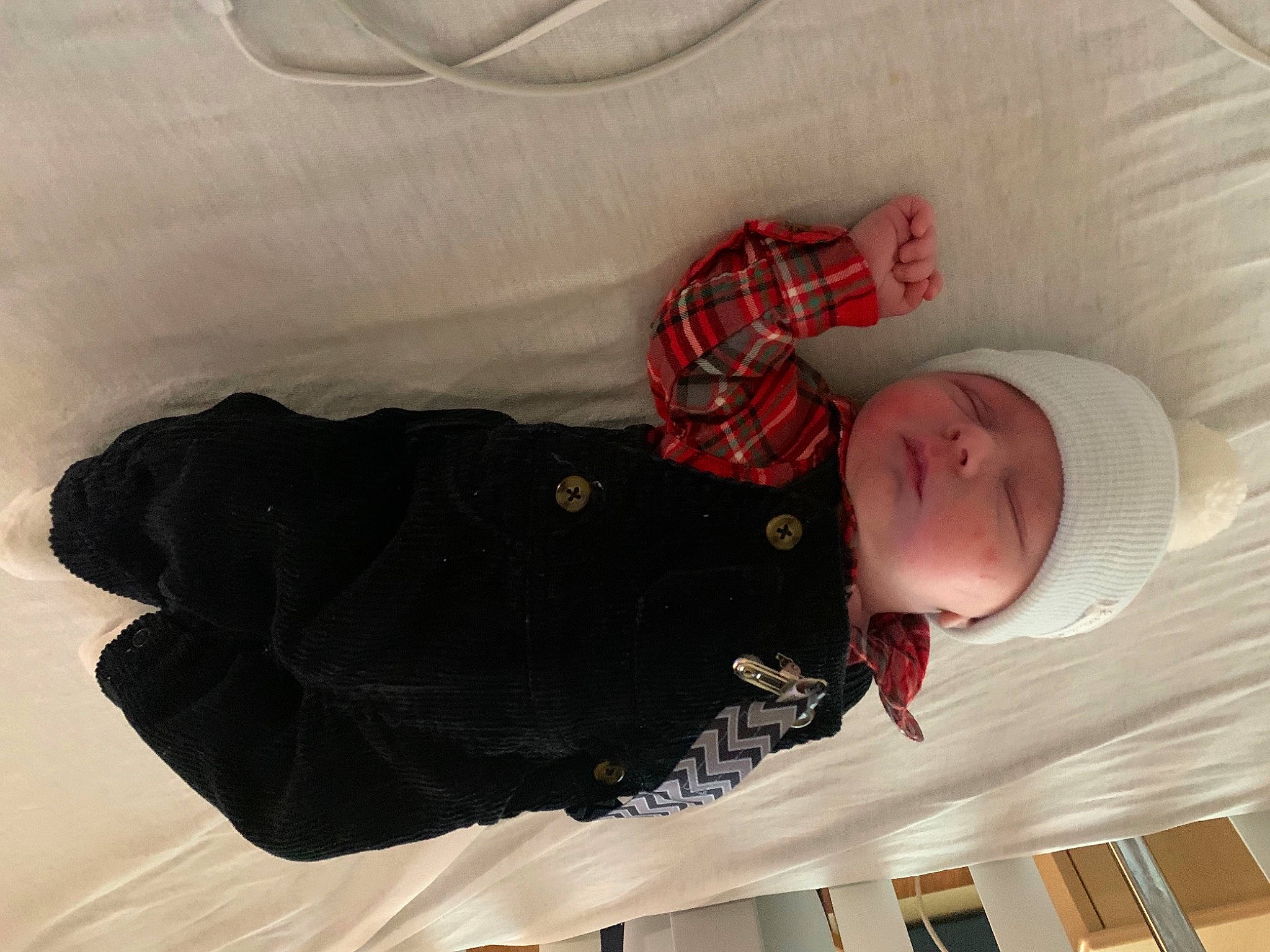 Boyd is registered to the contest to win money with this photo: arm, baby, baby_products, baby_toddler_clothing, beauty, child, comfort, finger, hand, headwear, jacket, linens, pattern, person, room, sleeve, sun_hat, t_shirt, textile, toddler