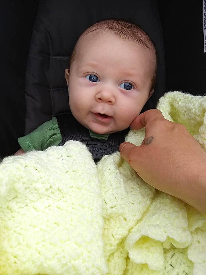 Tucker joined the competition — help win amazing prizes! baby, baby_products, blanket, cheek, child, chin, eye, face, hand, head, linens, lip, mouth, nose, person, product, skin, smile, textile, toddler