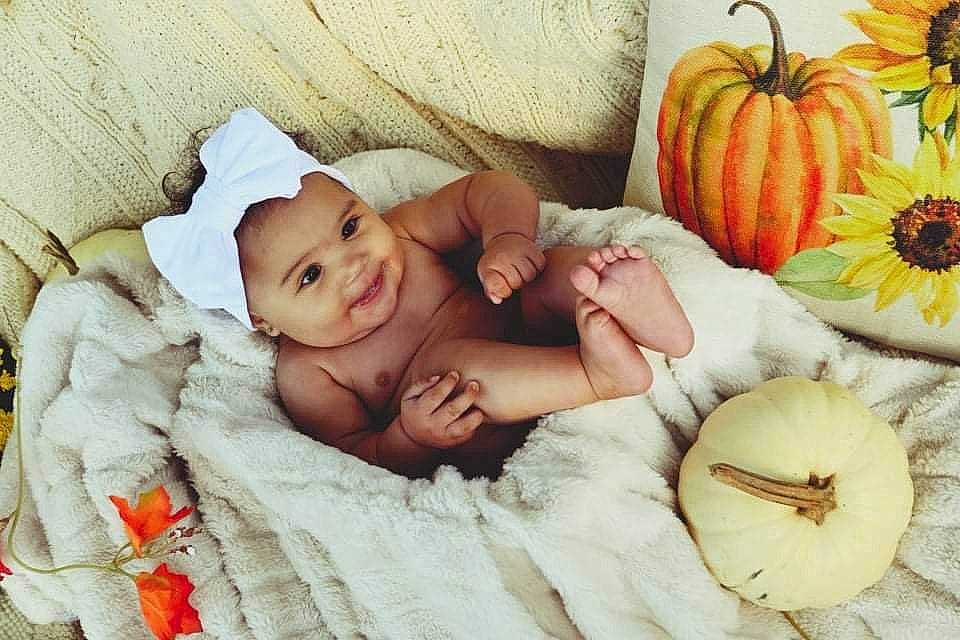 Octavia joined the competition — help win amazing prizes! baby, baby_toddler_clothing, calabaza, comfort, cucurbita, facial_expression, fruit, gourd, happy, headwear, iris, natural_foods, person, plant, product, pumpkin, skin, smile, squash, toddler