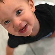Tyler joined the competition — help win amazing prizes! baby, black_shirt, child, crawling, cute, expression, eyes, face, floor_tiles, hand, happy, head, indoor, mouth, person, portrait, skin, smiling, toddler, young_child
