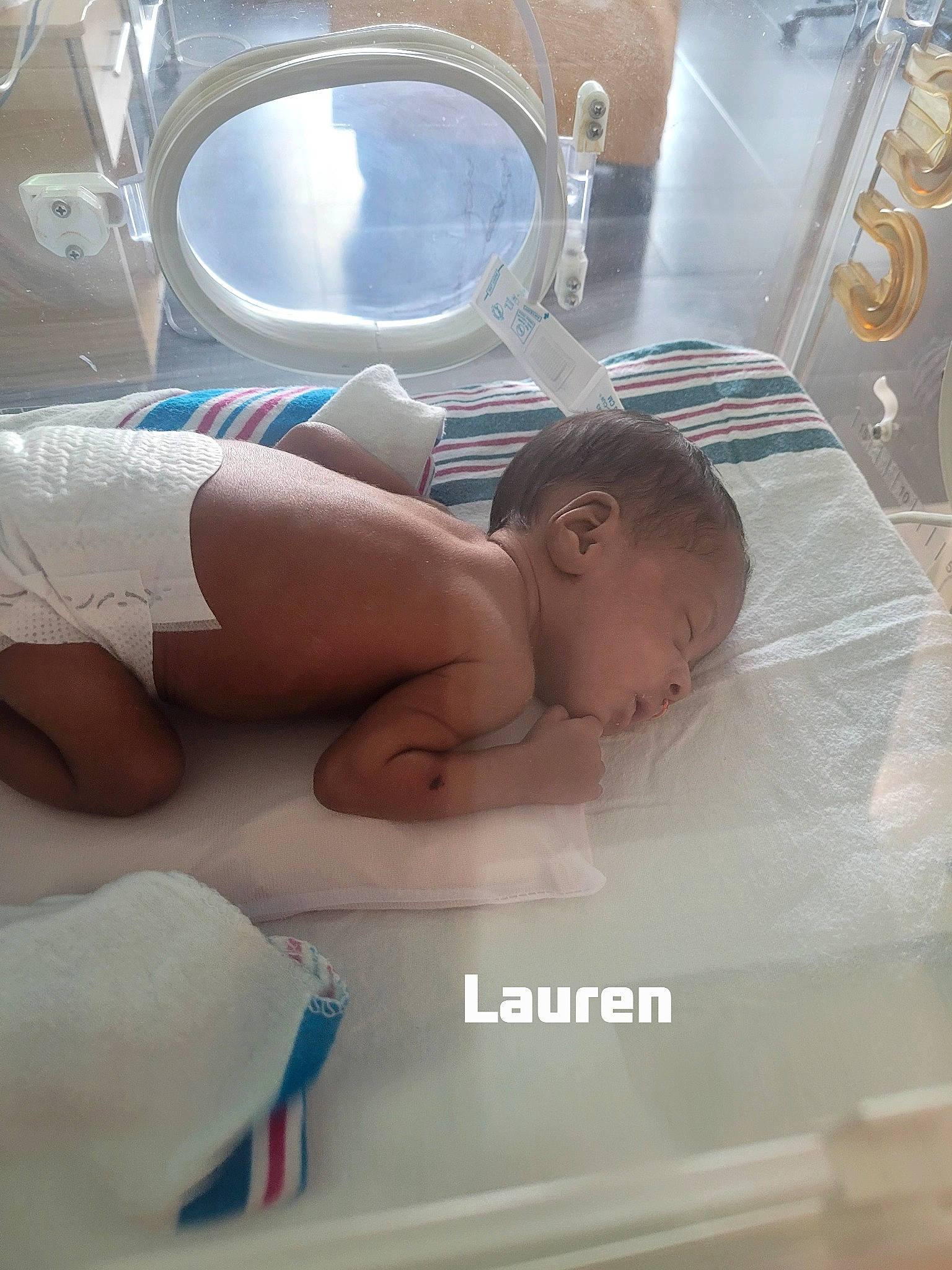 Lauren is registered to the contest to win money with this photo: abdomen, baby, bathing, bed, bedding, chest, child, childbirth, comfort, hospital, laundry_room, linens, medical, medical_equipment, medical_procedure, patient, person, room, service, thumb