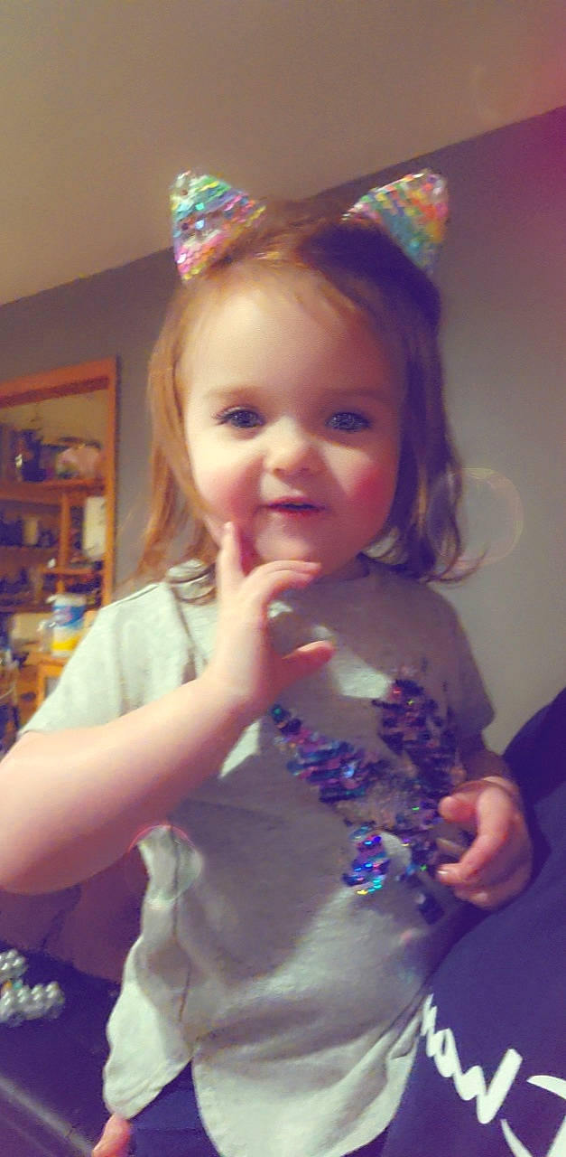 Anelia joined the competition — help win amazing prizes! dress, eye, face, facial_expression, finger, gesture, hairstyle, hand, happy, head, iris, organ, party_hat, person, photograph, pink, purple, skin, smile, standing