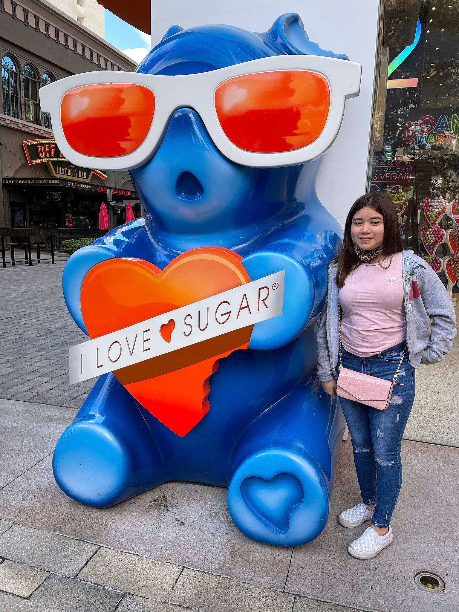 Krystal is registered to the contest to win money with this photo: azure, blue, city, electric_blue, eyewear, font, fun, goggles, happy, joy, orange, people, person, product, recreation, red, sitting, sunglasses, travel, vacation