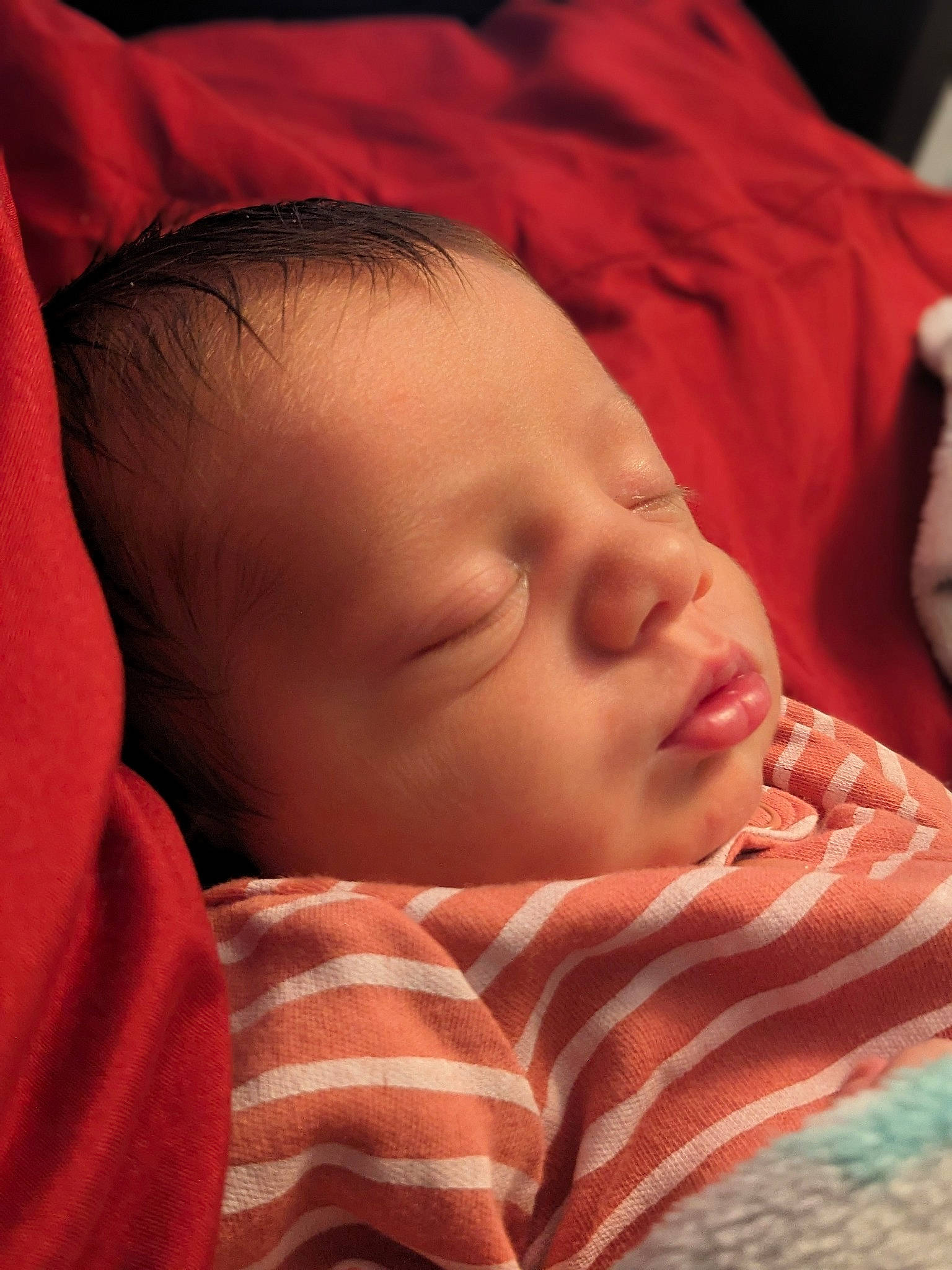 Grayson is registered to the contest to win money with this photo: baby, cheek, chin, comfort, ear, eyebrow, eyelash, face, facial_expression, forehead, head, lip, mammal, mouth, neck, nose, orange, person, skin, textile