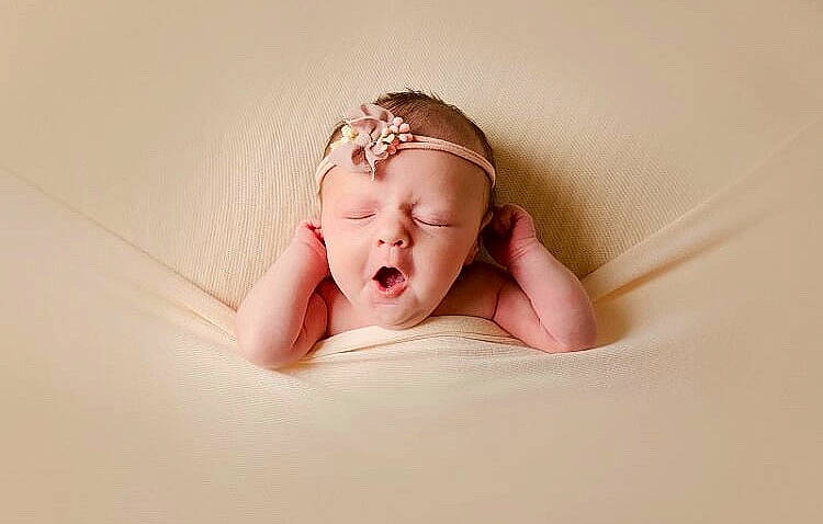 Amelia Grace Holding is registered to the contest to win money with this photo: baby, baby_sleeping, birth, child, close_up, face, facial_expression, hair_accessory, hand, head, headgear, headpiece, nose, person, photograph, photography, pink, product, skin, smile
