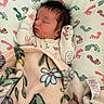 Alannah joined the competition — help win amazing prizes! newborn, baby, sleeping, blanket, mittens, face, hair, cushion, footprint_pattern, floral_pattern, cozy, resting, indoors, infant, cute, peaceful, soft, portrait, child, sleep