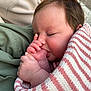 baby, infant, sleeping, thumb_sucking, blanket, striped, cozy, cute, child, peaceful, closeup, face, hand, skin, soft, nap, cuddle, warm, comfort, portrait