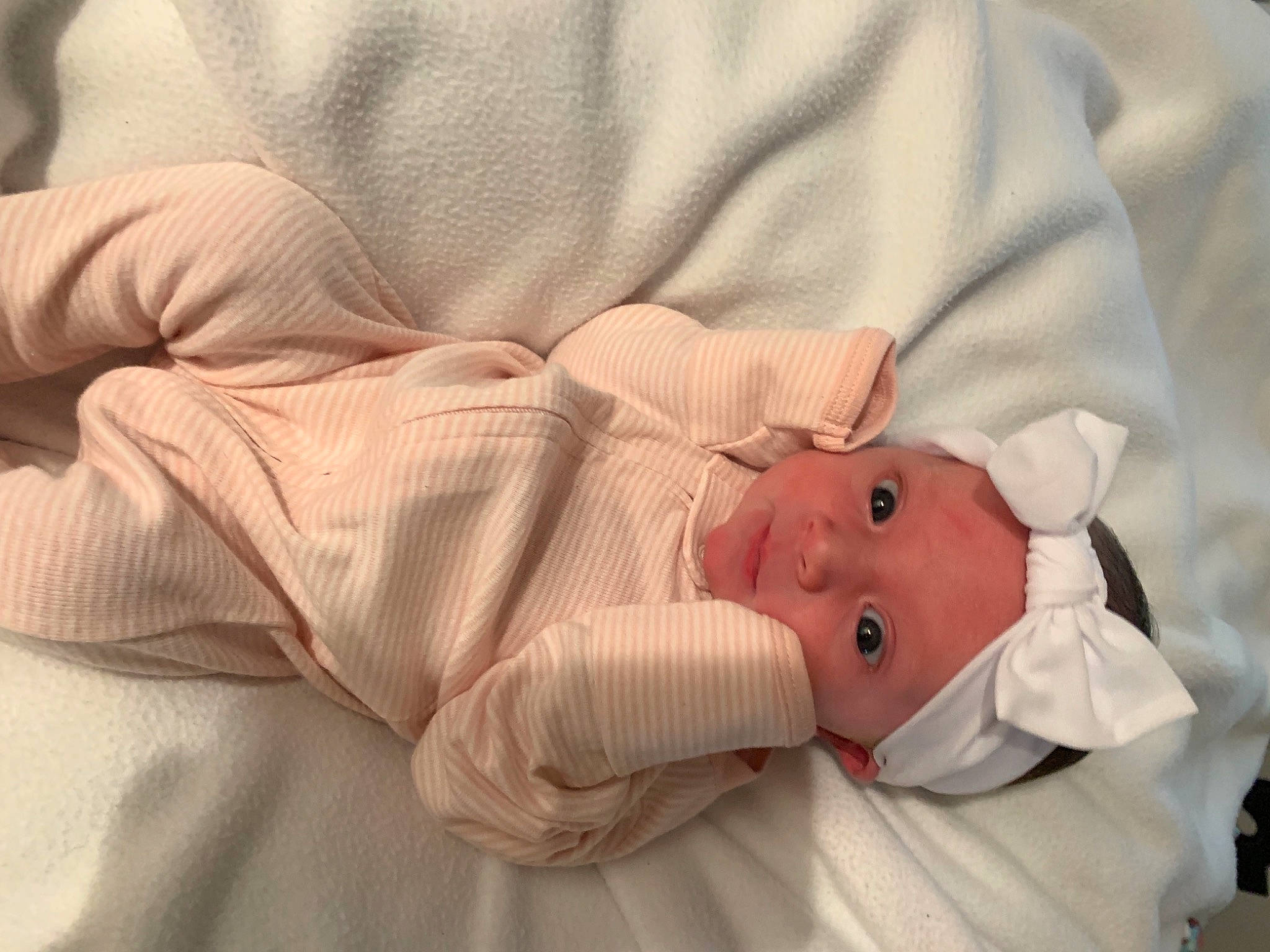 Charlie joined the competition — help win amazing prizes! baby, baby_products, baby_safety, baby_sleeping, baby_toddler_clothing, bed_sheet, bedding, child, comfort, eye, flesh, hand, headwear, human_body, linens, peach, person, room, sleep, sleeve