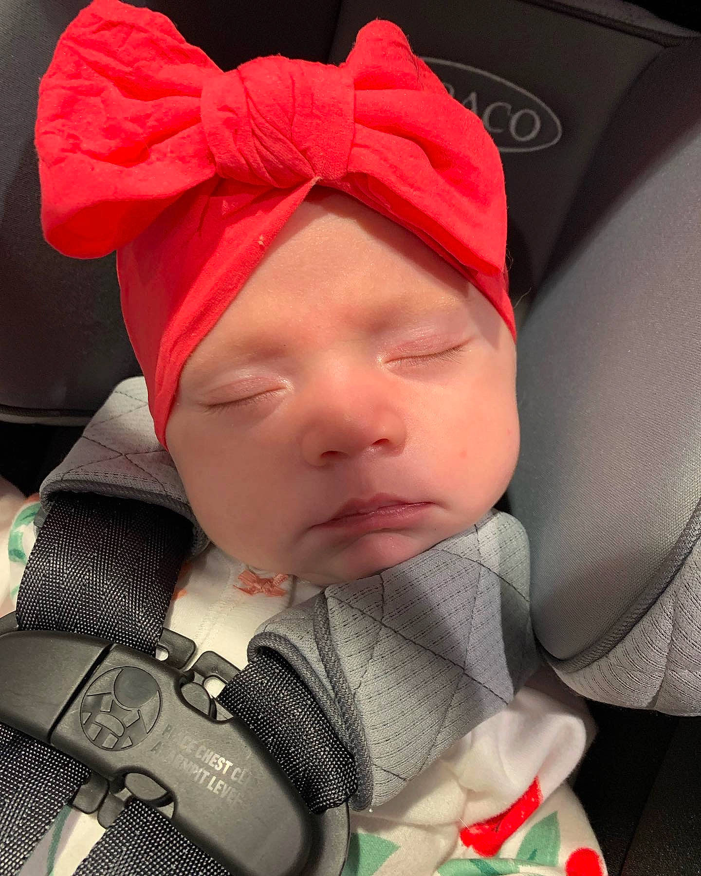 Charlie joined the competition — help win amazing prizes! baby, baby_in_car_seat, baby_sleeping, cap, cheek, comfort, cool, eye, eyebrow, eyelash, face, head, headgear, headwear, lip, mouth, nose, outerwear, person, skin
