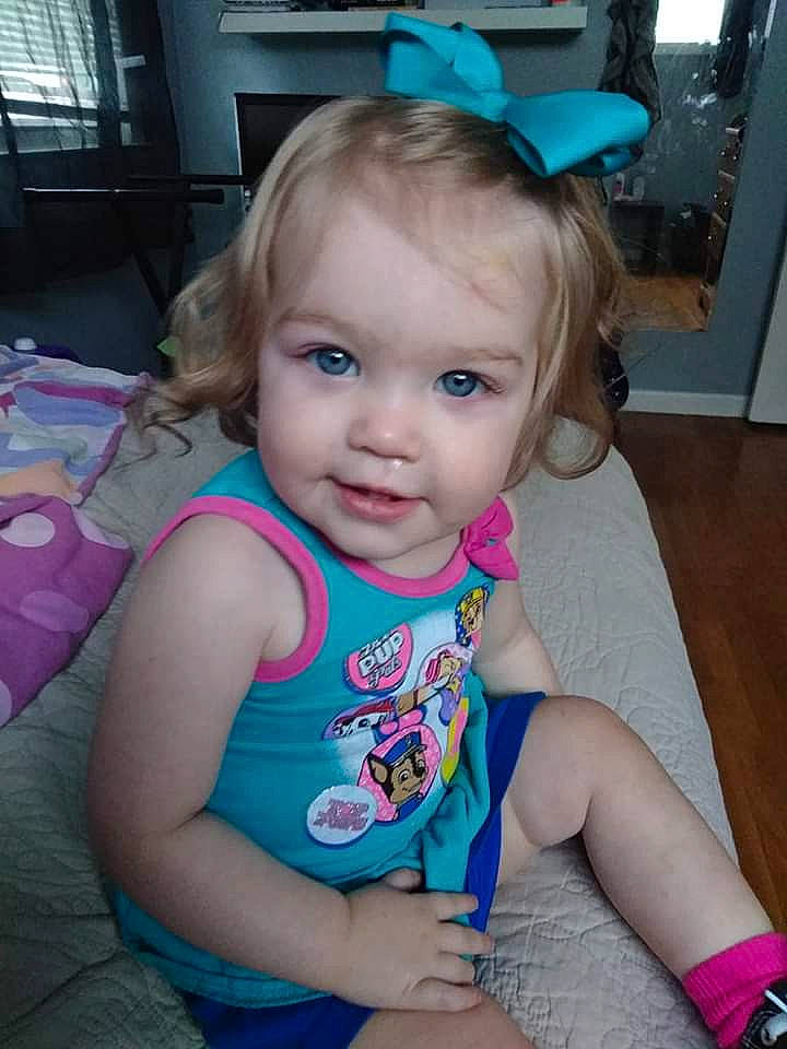 Jade is registered to the contest to win money with this photo: baby, baby_toddler_clothing, cheek, child, ear, face, head, iris, person, play, sitting, skin, smile, toddler