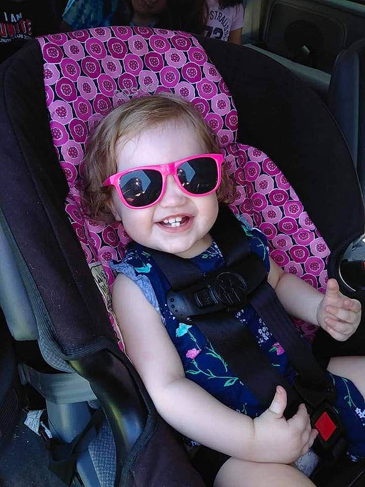 Jade joined the competition — help win amazing prizes! car_seat, child, cool, design, eyewear, fun, glasses, goggles, hat, headgear, joy, lip, magenta, pattern, person, personal_protective_equipment, pink, purple, sun_hat, sunglasses