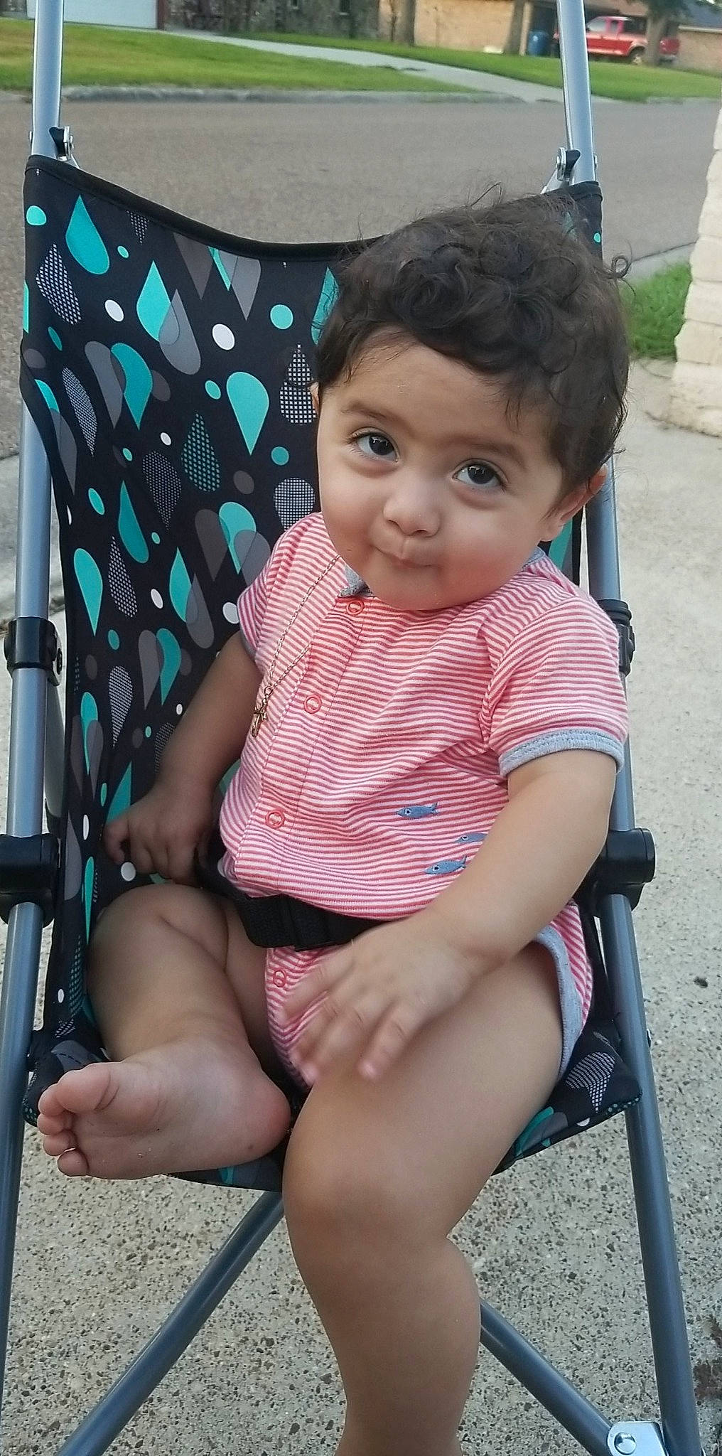 Lionel is registered to the contest to win money with this photo: baby, black_hair, chair, cheek, child, leg, person, product, sitting, smile, thigh, toddler