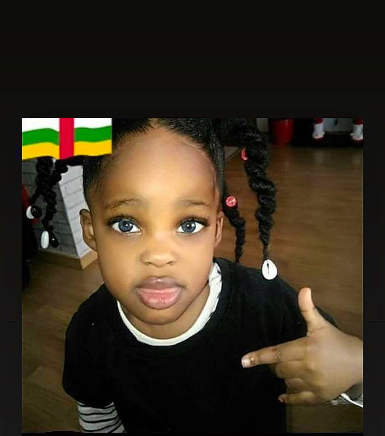 Safiyya participe au concours pour gagner de l'argent avec cette photo : audio_equipment, cheek, child, darkness, ear, eyelash, fashion_accessory, flash_photography, fun, gesture, happy, headphones, jewellery, nose, person, portrait_photography, room, t_shirt, thumb, toddler