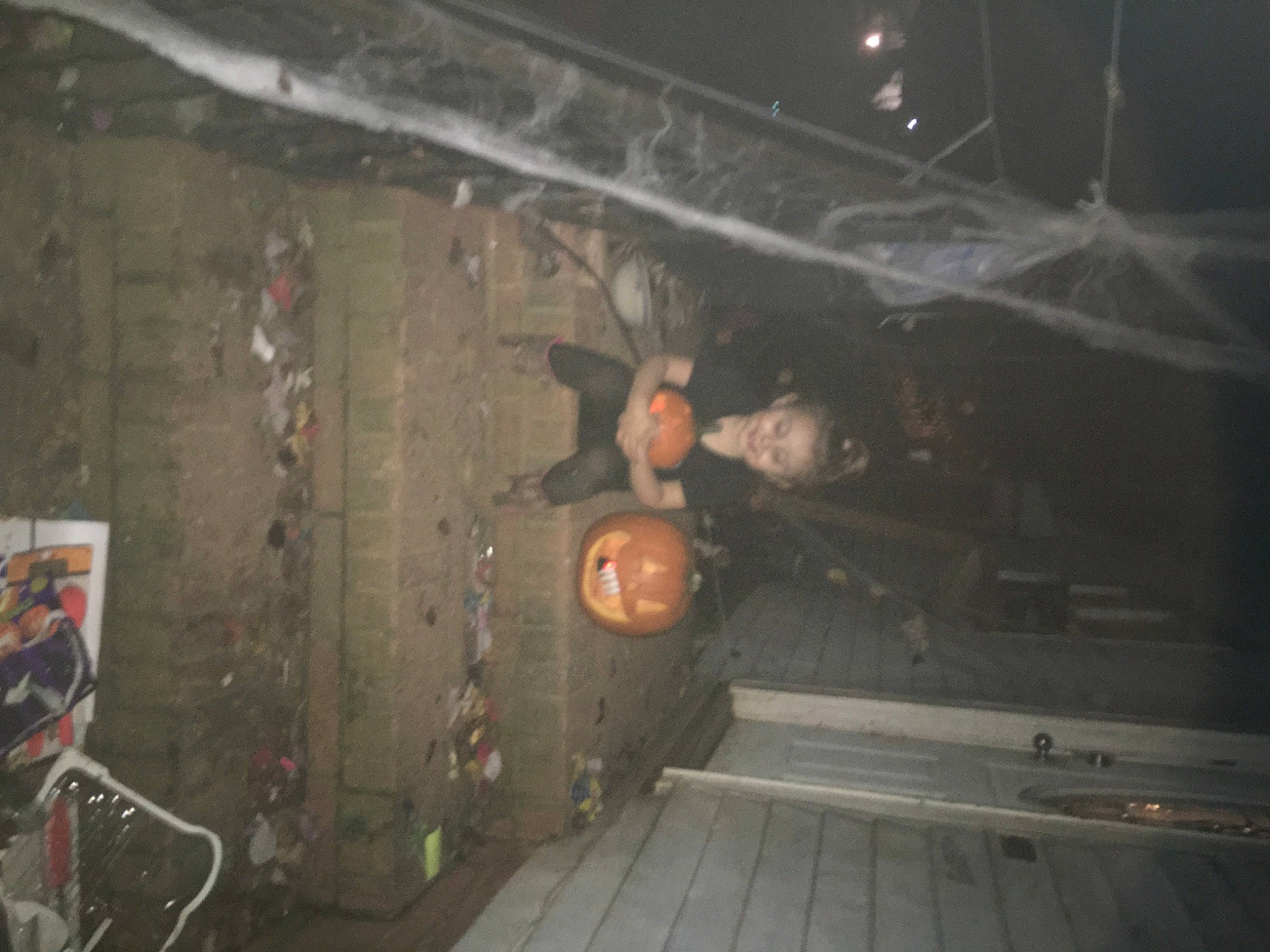 Judith is registered to the contest to win money with this photo: adventure, ceiling, concrete, darkness, event, flash_photography, fun, helmet, joy, midnight, night, person, room, smile, space, wood