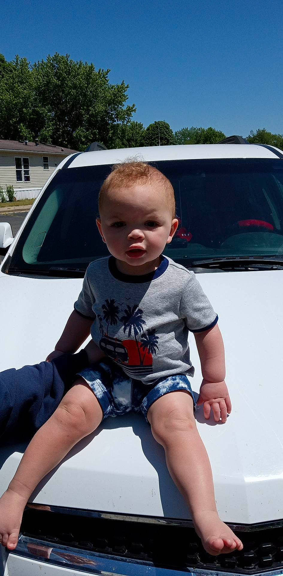 Kingston joined the competition — help win amazing prizes! automotive_design, automotive_exterior, automotive_lighting, automotive_tire, bumper, car, electric_blue, hairstyle, hand, hood, leg, motor_vehicle, person, shorts, sky, t_shirt, thigh, toddler, tree, vehicle