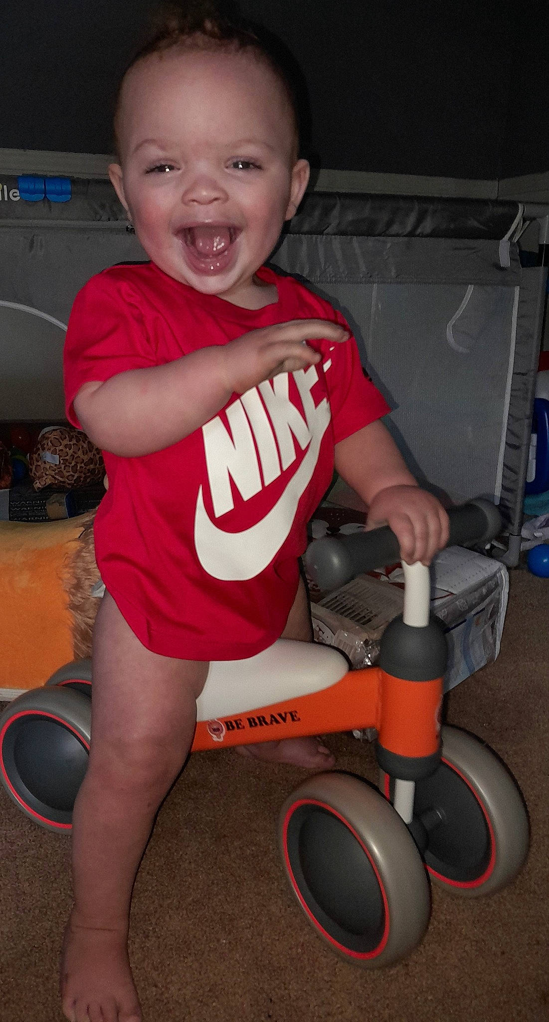 Kingston is registered to the contest to win money with this photo: automotive_tire, automotive_wheel_system, elbow, flash_photography, flooring, fun, happy, human_body, human_leg, knee, leg, muscle, person, physical_fitness, shorts, smile, sportswear, standing, thigh, tire