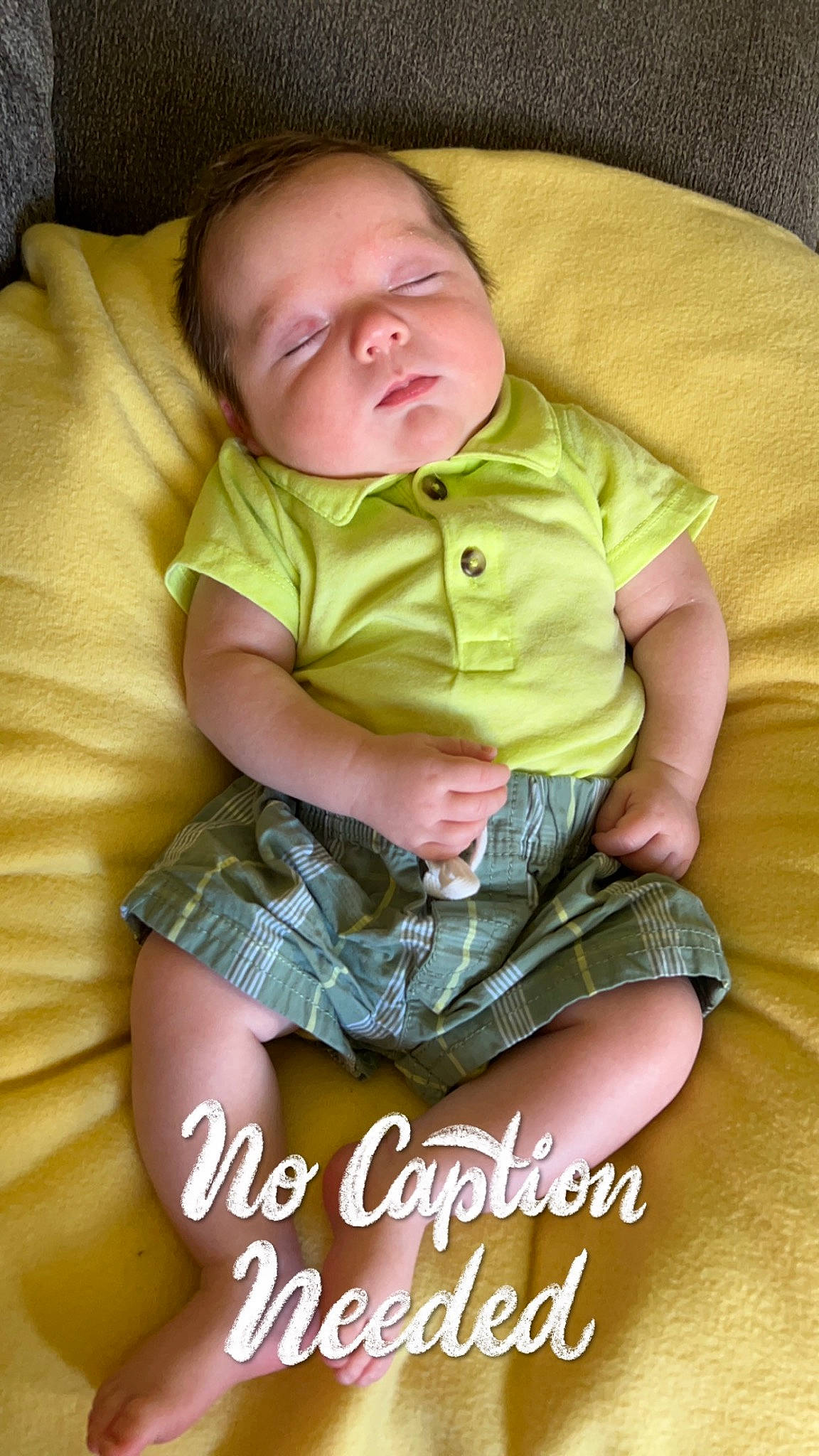 Briggs is registered to the contest to win money with this photo: baby, baby_products, baby_toddler_clothing, cheek, child, comfort, finger, happy, human_body, human_leg, iris, knee, lap, linens, mouth, person, sitting, skin, sleeve, thigh