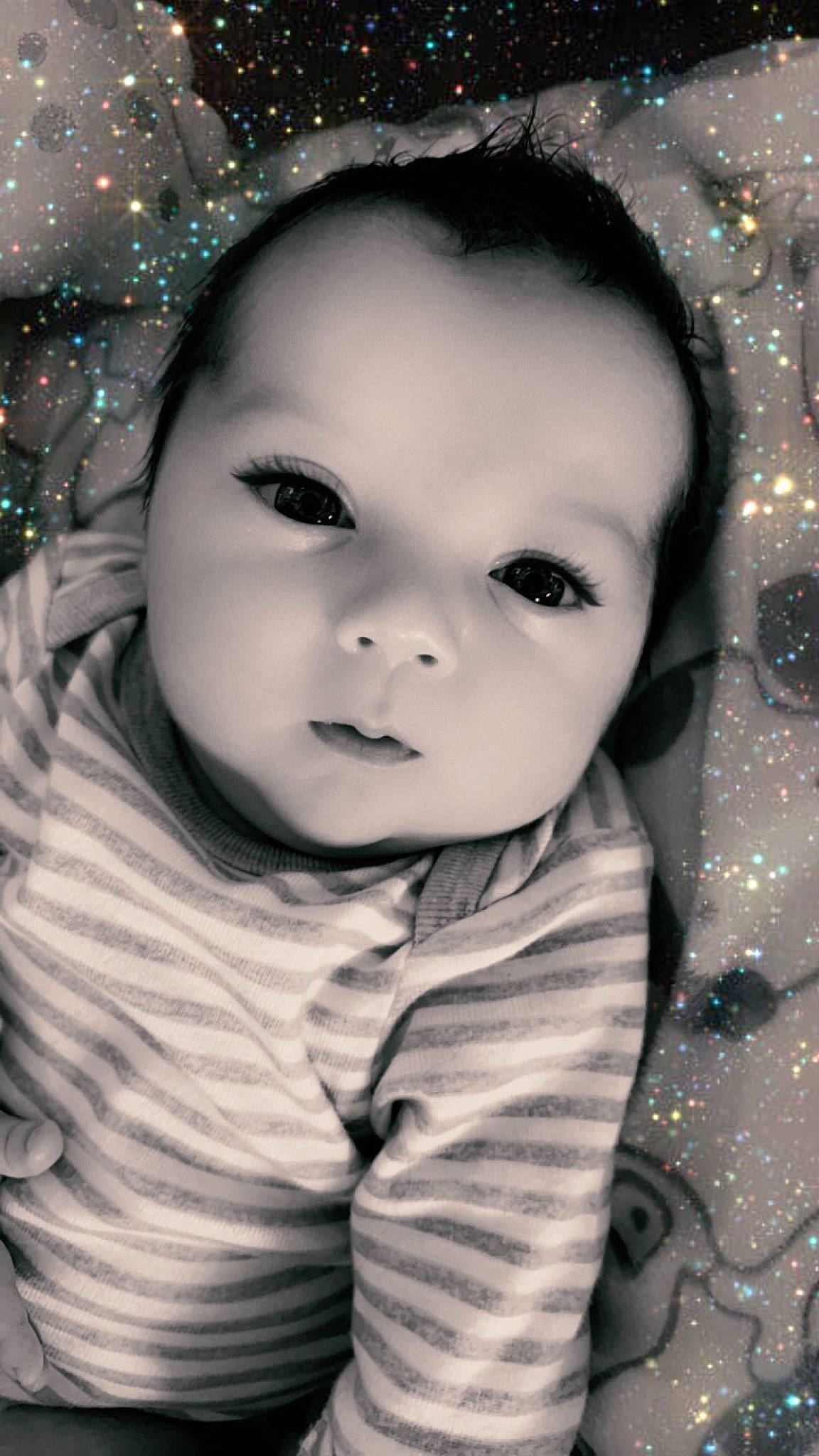 Briggs is registered to the contest to win money with this photo: baby, baby_toddler_clothing, black_and_white, cheek, chin, cool, eye, eyebrow, facial_expression, flash_photography, fun, hairstyle, happy, iris, lip, nose, person, skin, sleeve, standing