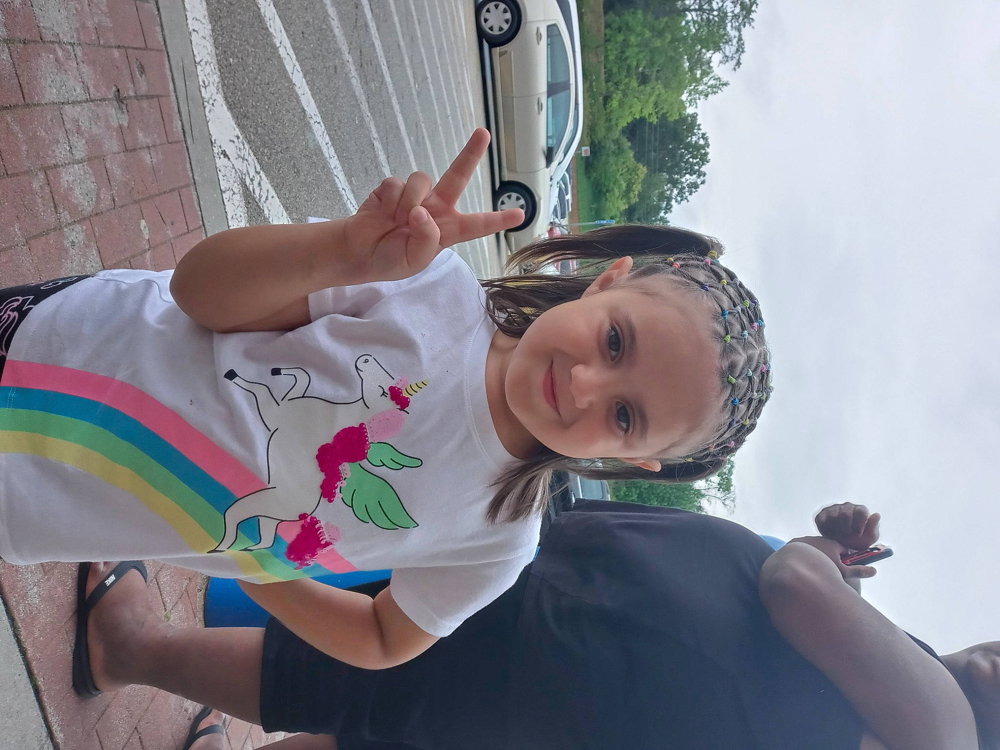 Alize is registered to the contest to win money with this photo: auto_part, automotive_exterior, automotive_lighting, automotive_window_part, bumper, car, child, family_car, fun, happy, headwear, joy, leisure, motor_vehicle, person, pink, plant, recreation, sky, t_shirt