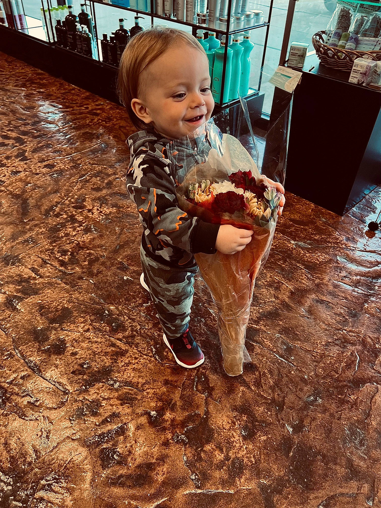 Henry joined the competition — help win amazing prizes! baby, child, city, dessert, flooring, fun, grass, hairstyle, happy, leg, leisure, people_in_nature, person, sitting, smile, soil, toddler, tree, wood