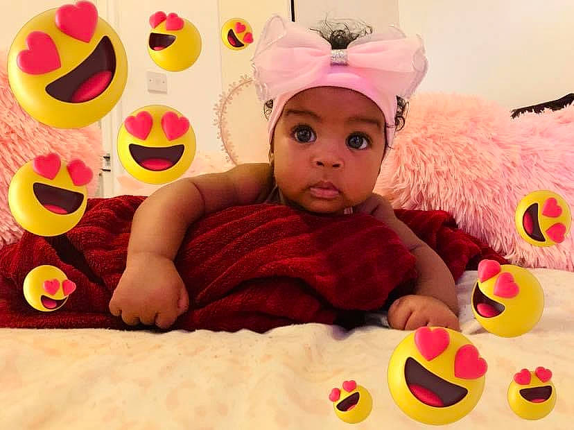 Chelsea is registered to the contest to win money with this photo: baby, child, ear, hair_accessory, happy, headgear, headwear, person, pink, play, smile, stuffed_toy, toddler, toy