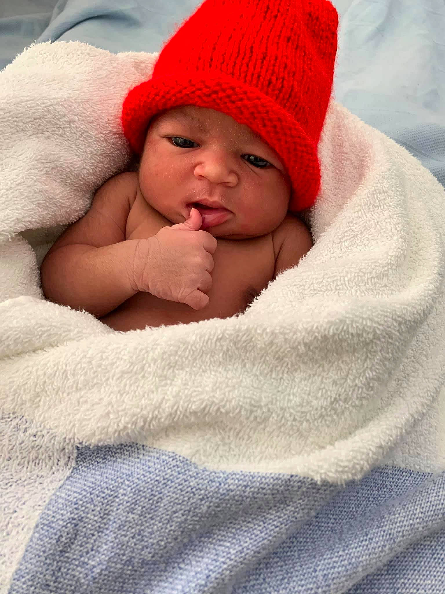 Chelsea joined the competition — help win amazing prizes! baby, baby_sleeping, blanket, cheek, child, headgear, headwear, knit_cap, linens, lip, nose, person, skin, sleep, textile, toddler, wool