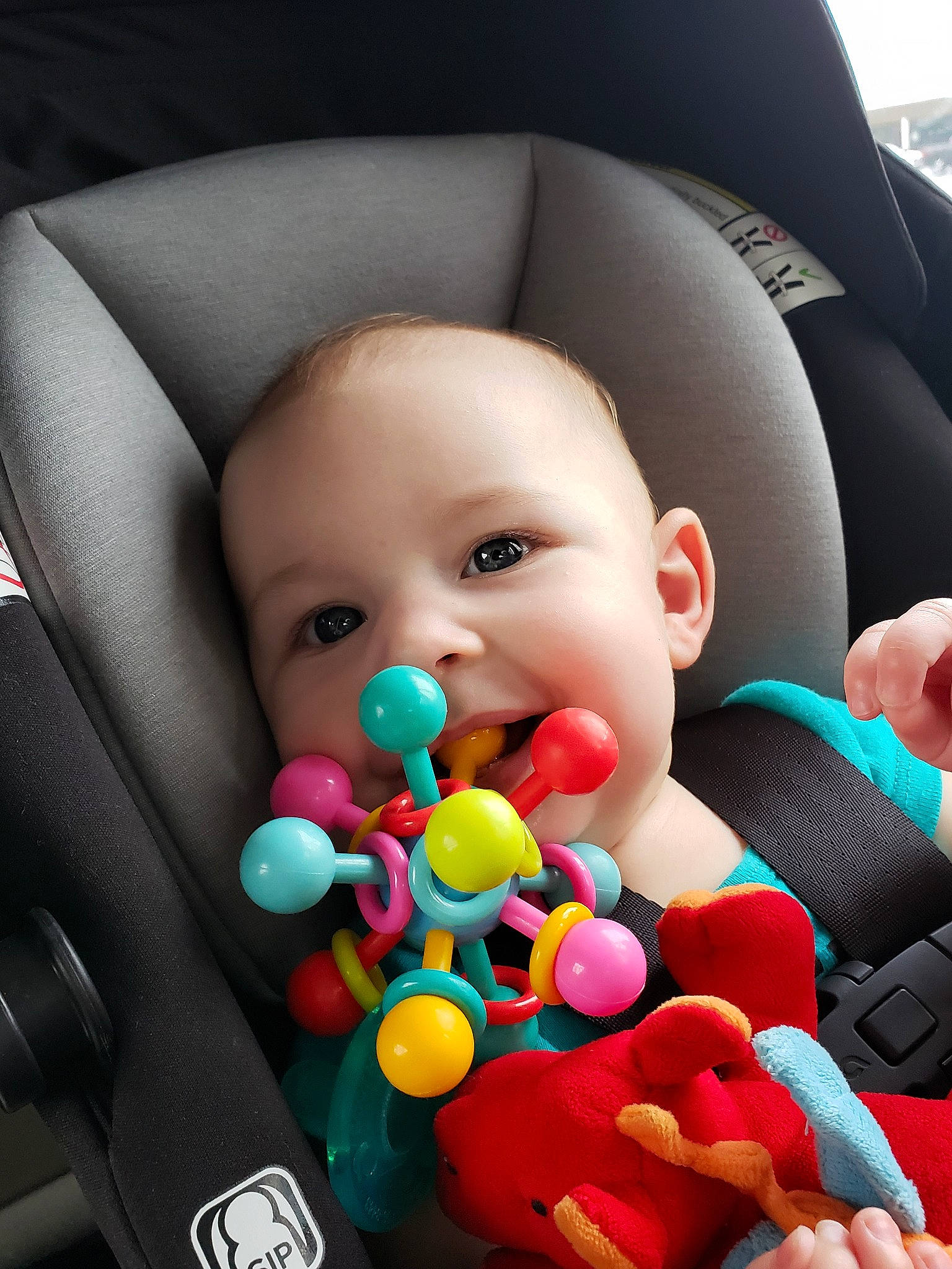 Zaria joined the competition — help win amazing prizes! baby, baby_in_car_seat, baby_playing_with_toys, baby_toys, car_seat, child, person, play, product, skin, toddler, toy