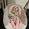 Bella is registered to the contest to win money with this photo: baby, infant, pacifier, pink_bow, pink_socks, baby_rocker, seat_belt, indoor, carpet, door, clothing, headband, person, child, cute, comfort, resting, baby_girl, furniture, soft